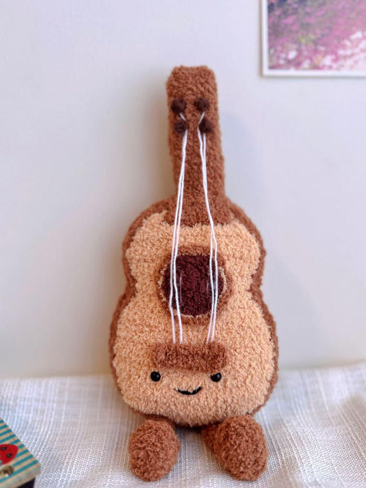 Mini Guitar Plushie Crochet Pattern – finished amigurumi made with plush yarn